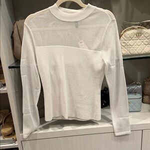 Elegant White Sheer Panel Top
Aqua